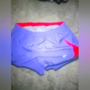 Women's Nike shorts size small purple in color
